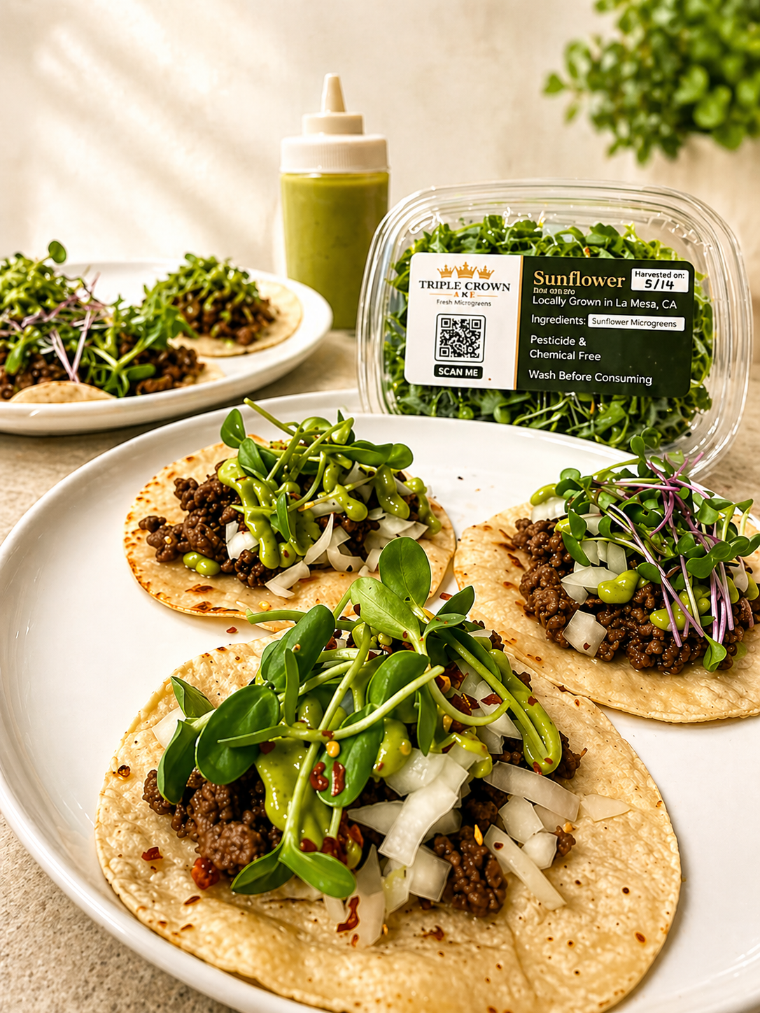 Tacos topped with fresh sunflower and radish microgreens beside Triple Crown AKE packaging